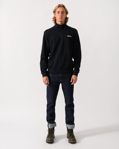 full length studio photograph of a model wearing a Napapijri Small Box Mens Half Zip Sweatshirt in Black Beauty 941