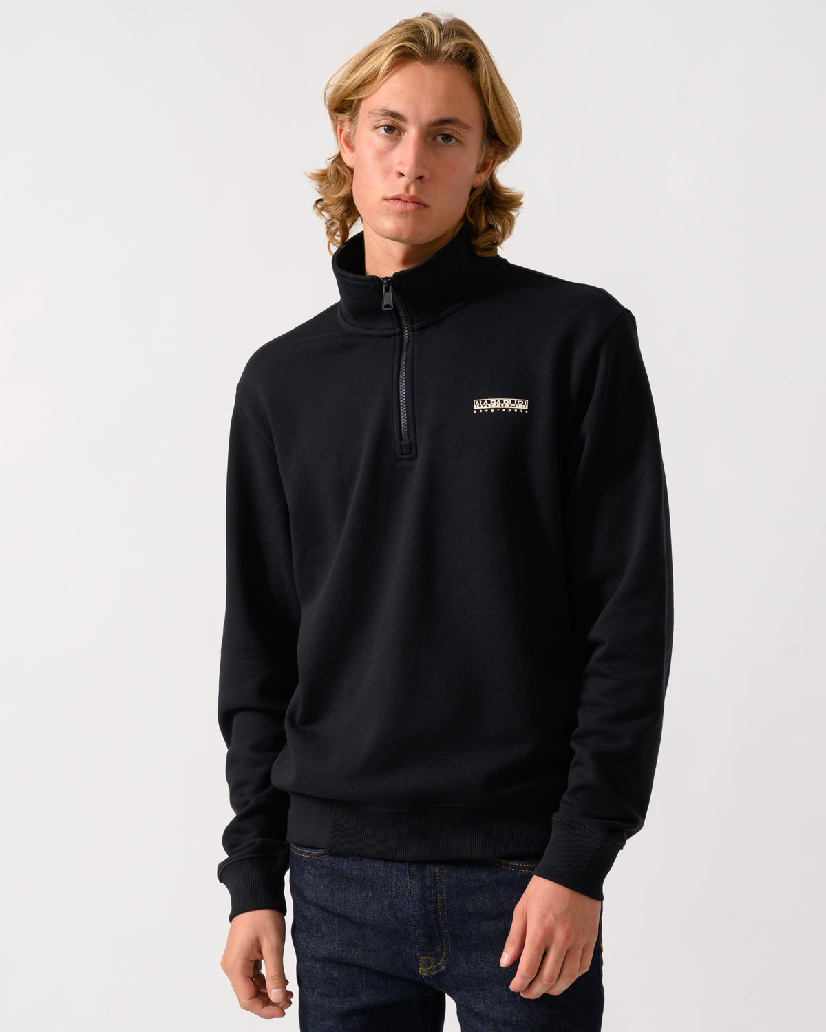 studio photograph of a model wearing a Napapijri Small Box Mens Half Zip Sweatshirt in Black Beauty 941