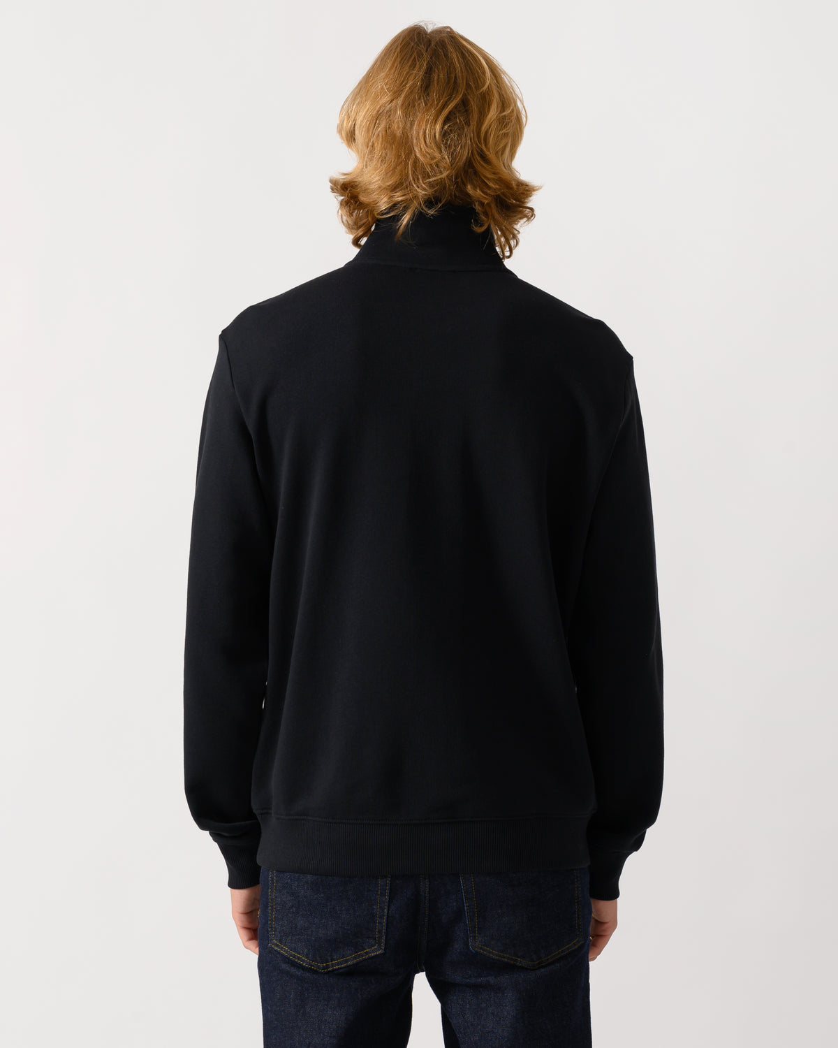 studio photograph showing back of a model wearing a Napapijri Small Box Mens Half Zip Sweatshirt in Black Beauty 941