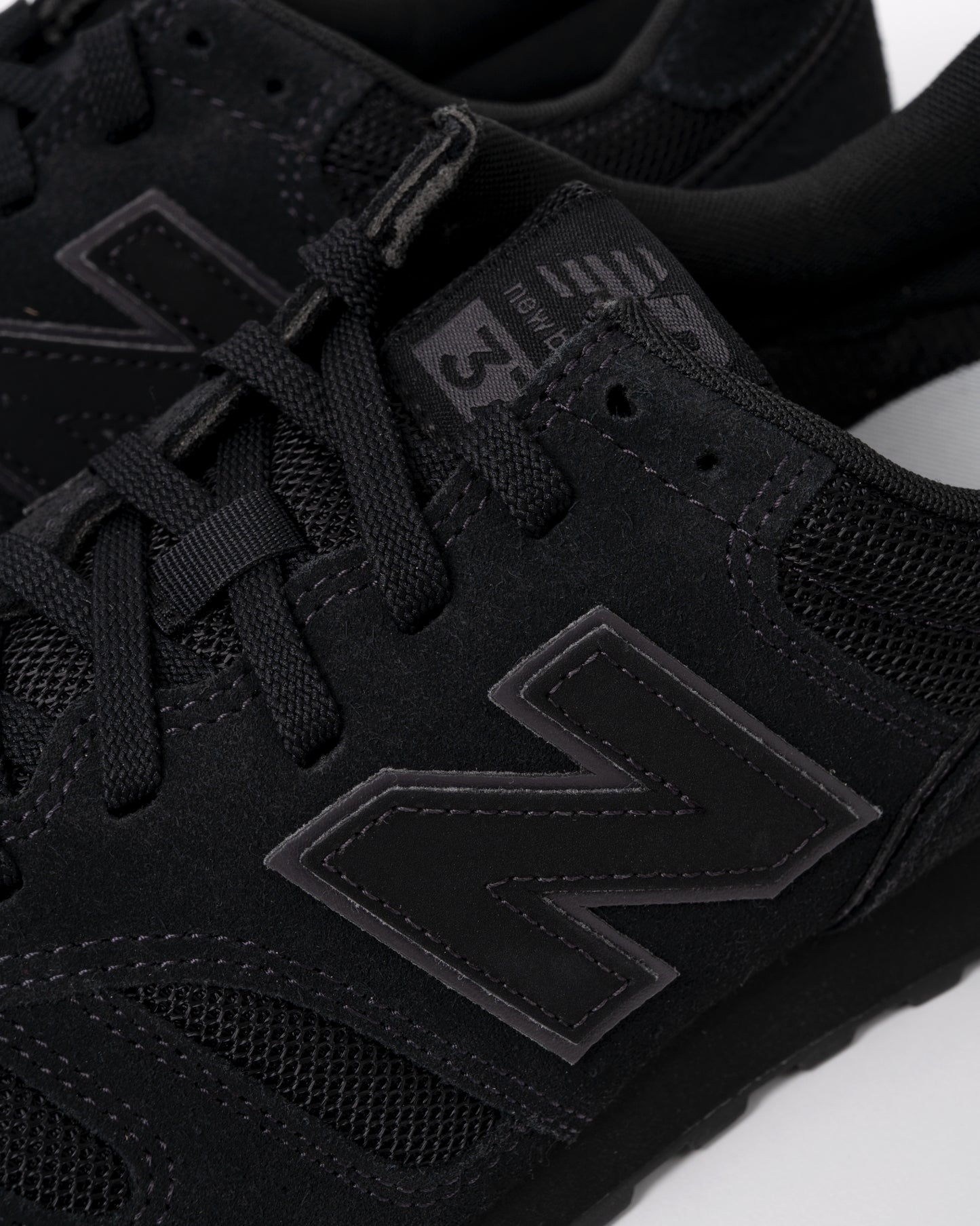 detail of New Balance 373 Mens Trainers in Black