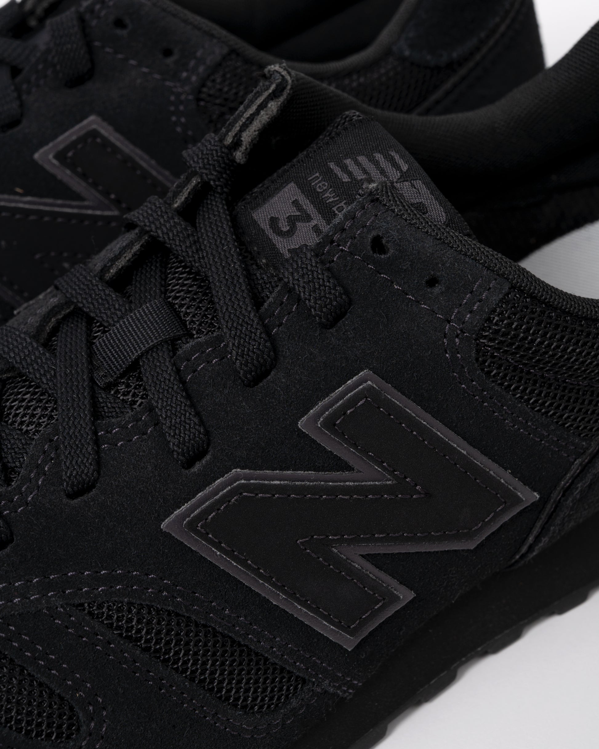 detail of New Balance 373 Mens Trainers in Black