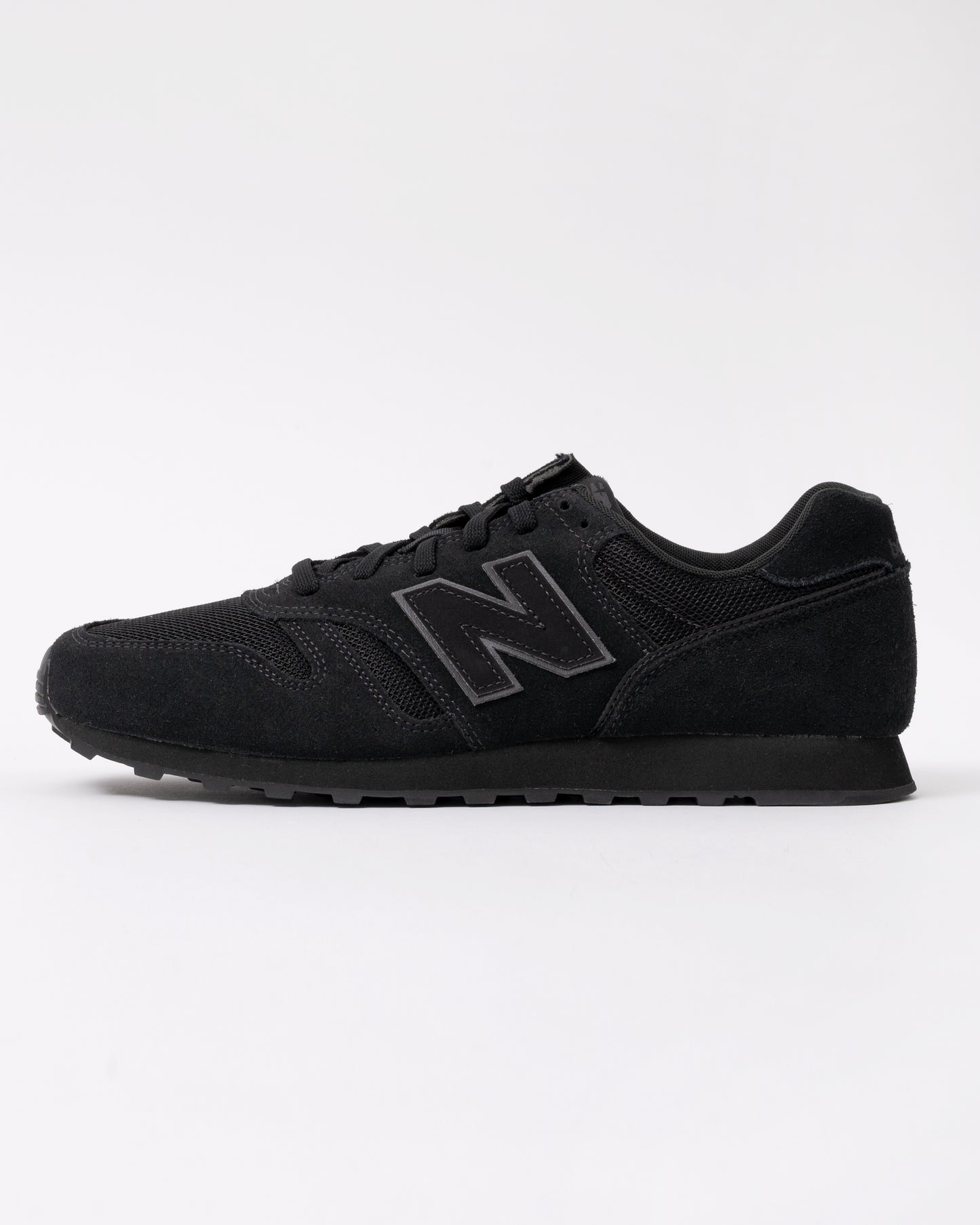 side of New Balance 373 Mens Trainers in Black