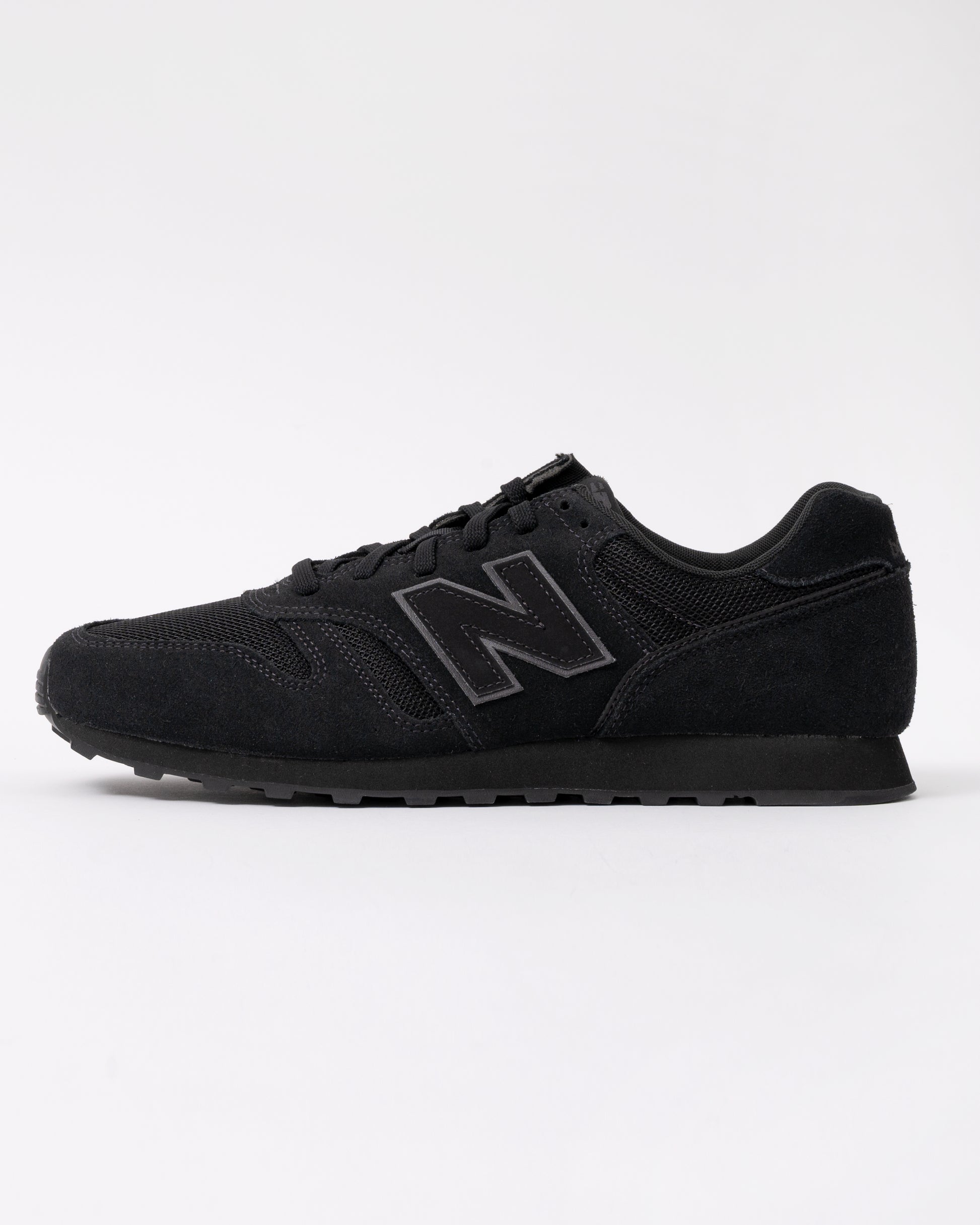 side of New Balance 373 Mens Trainers in Black
