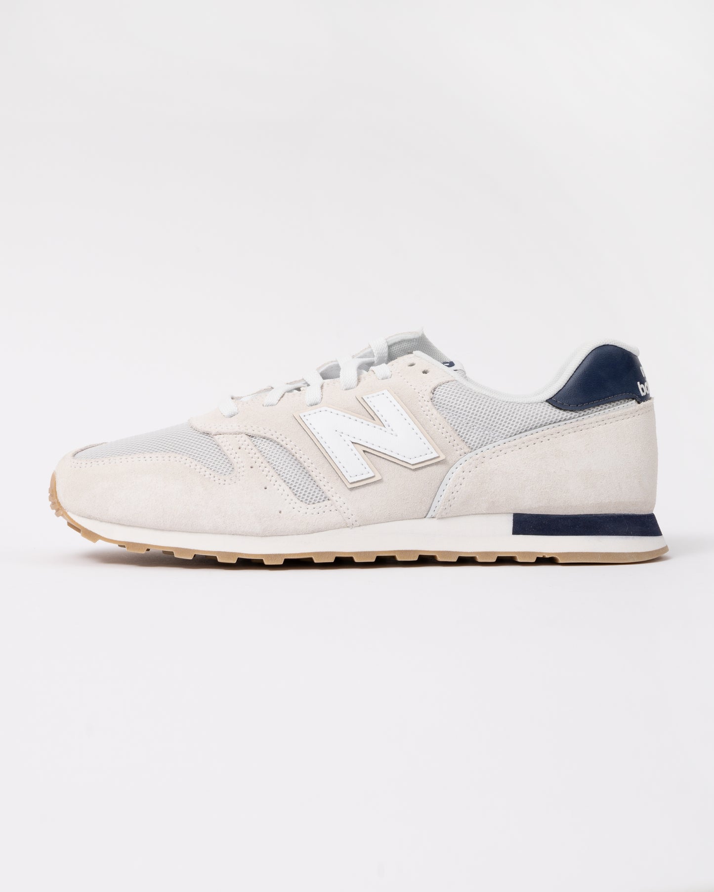 side of New Balance 373 Mens Trainers in Sea Salt
