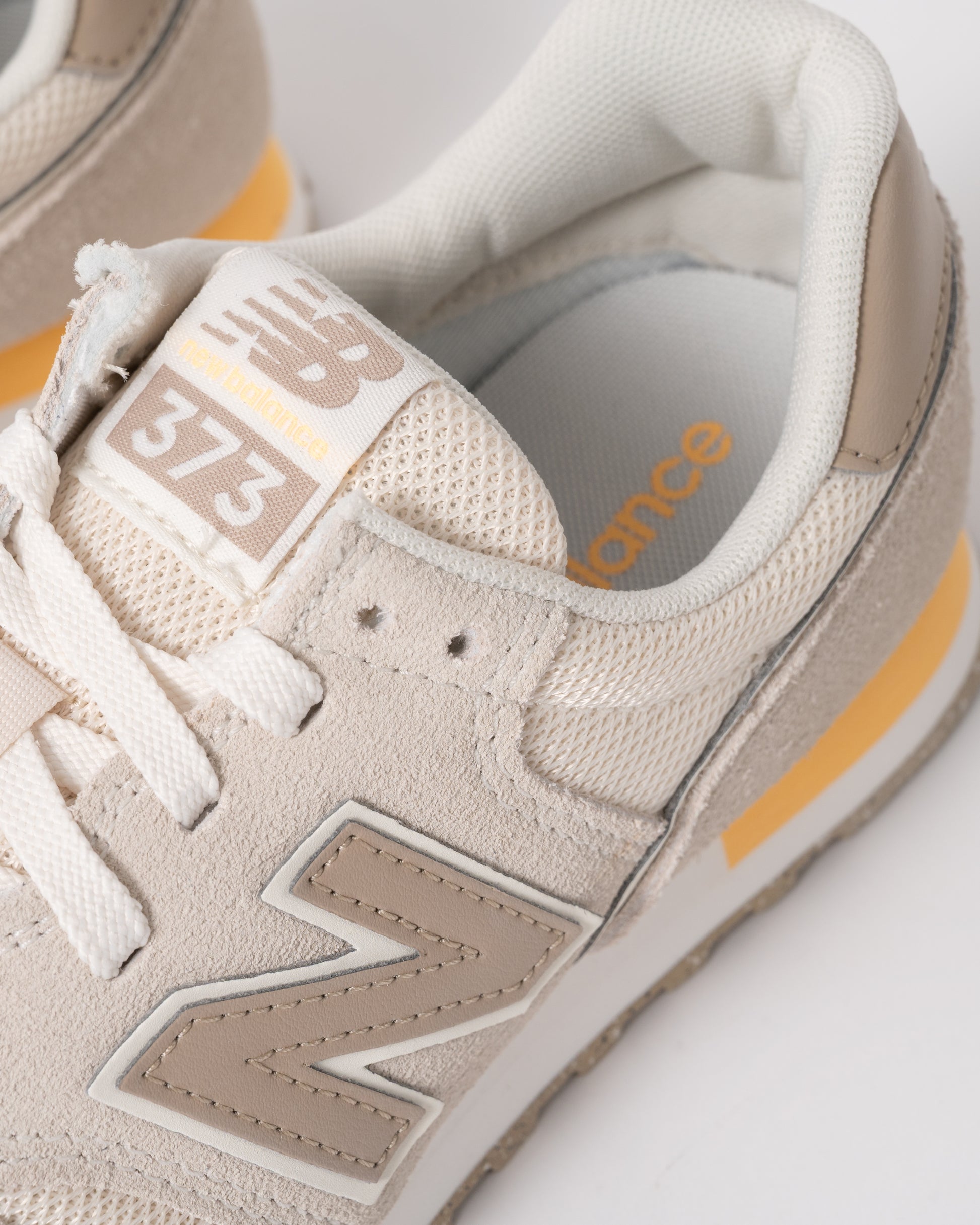 detail of New Balance 373 Womens Trainers in Linen