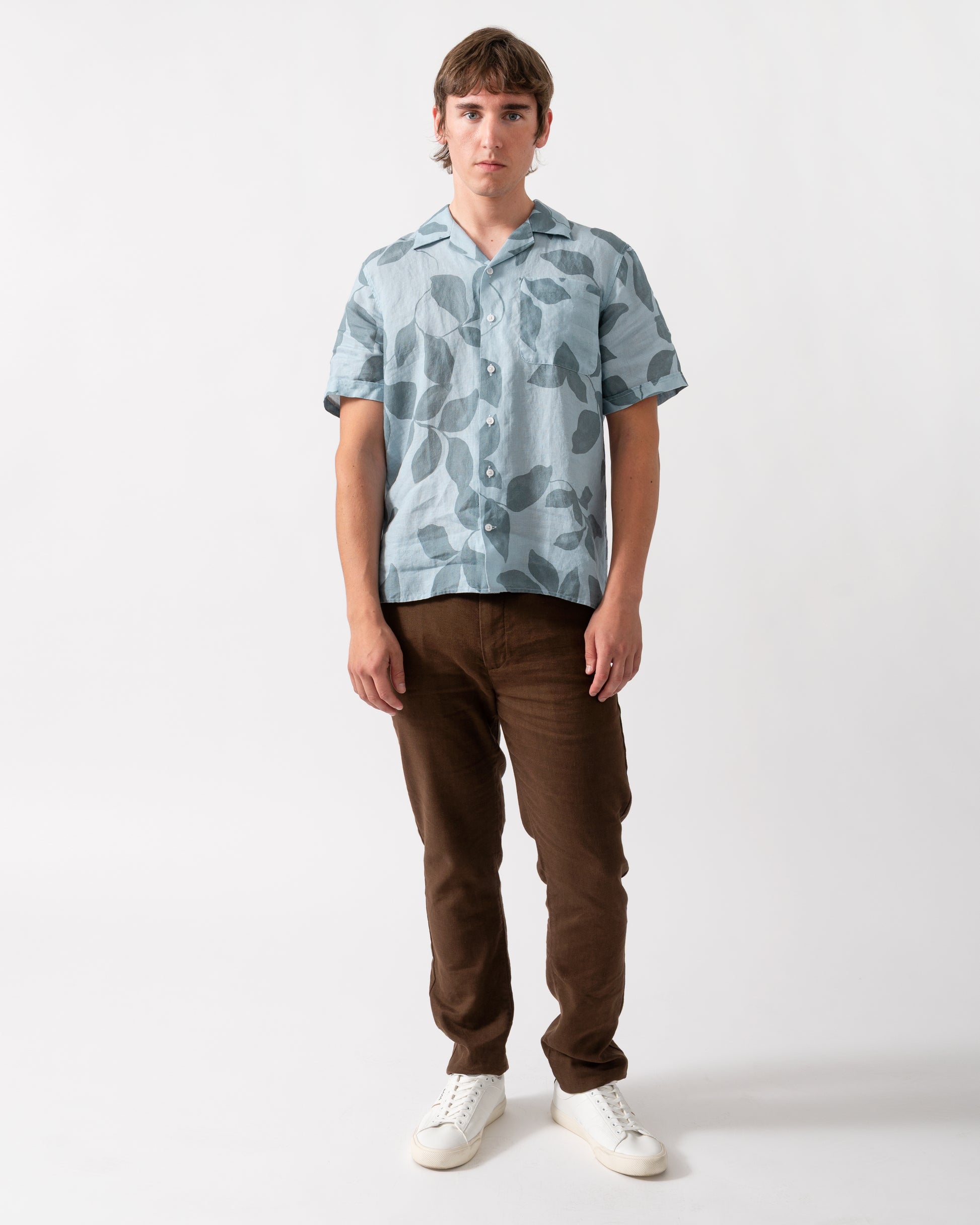 full length of model wearing a Oliver Sweeney Marvao Mens Linen Shirt in Blue