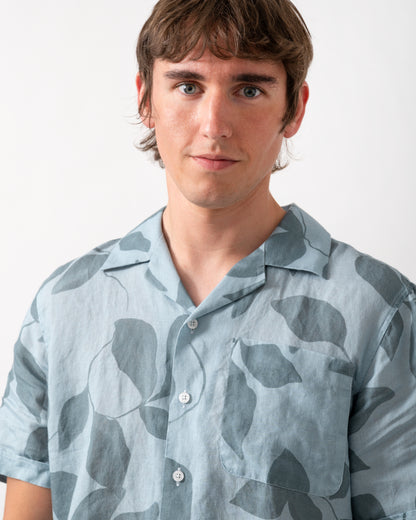 close up of model wearing a Oliver Sweeney Marvao Mens Linen Shirt in Blue