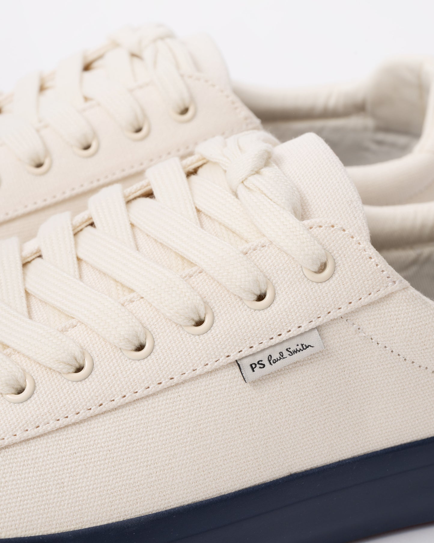Discover designer mens trainers with Paul Smith's Amos Canvas Mens Trainers in 02 White