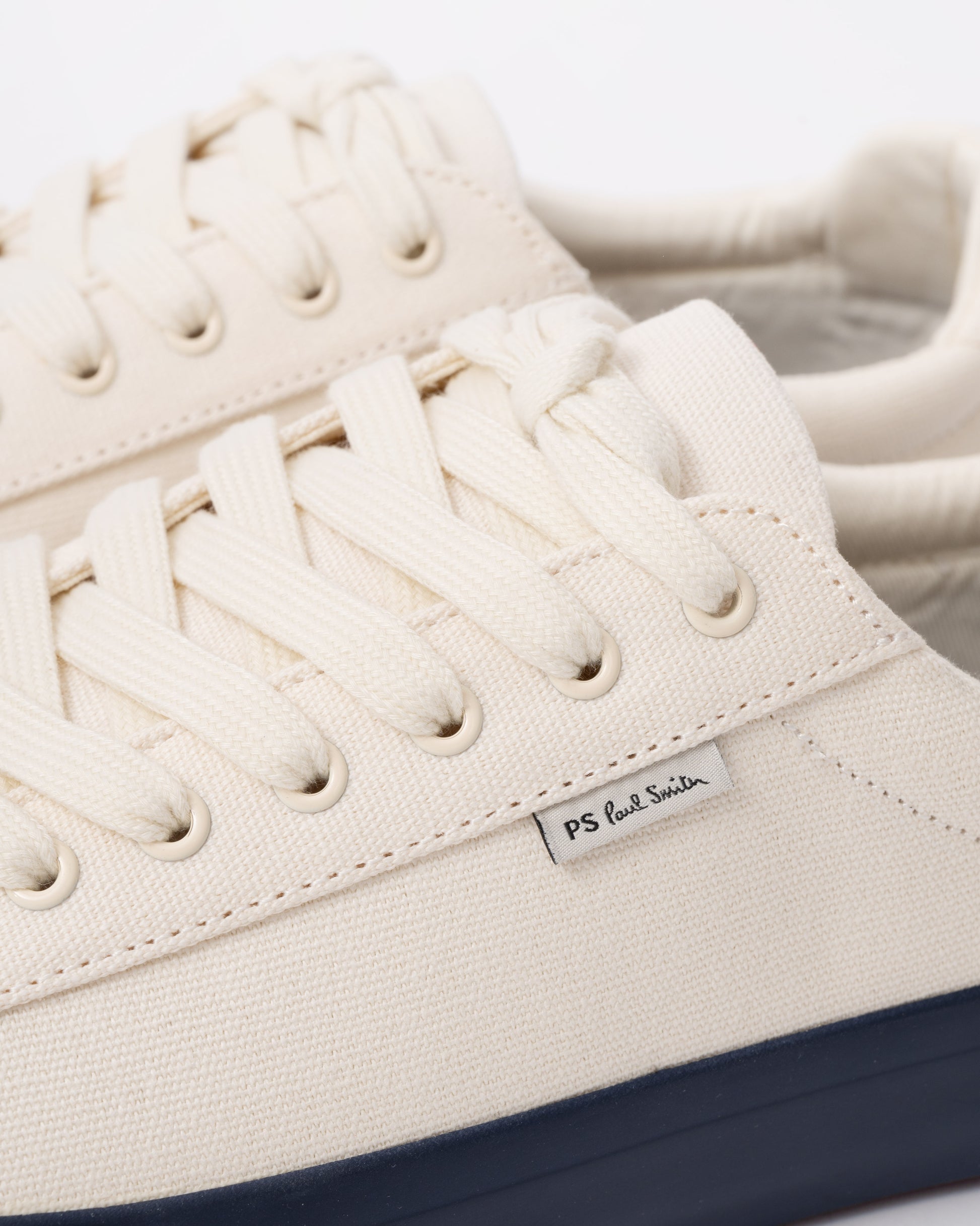Discover designer mens trainers with Paul Smith's Amos Canvas Mens Trainers in 02 White