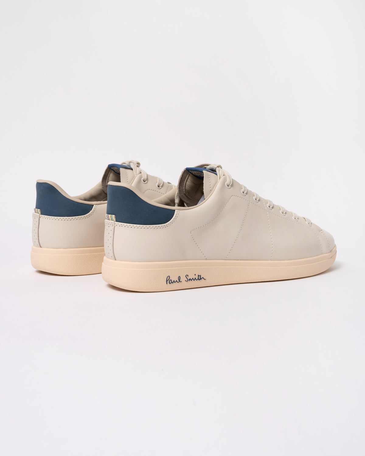 Studio photograph showing back of PS Paul Smith Chip Leather Mens Trainers in 01 White
