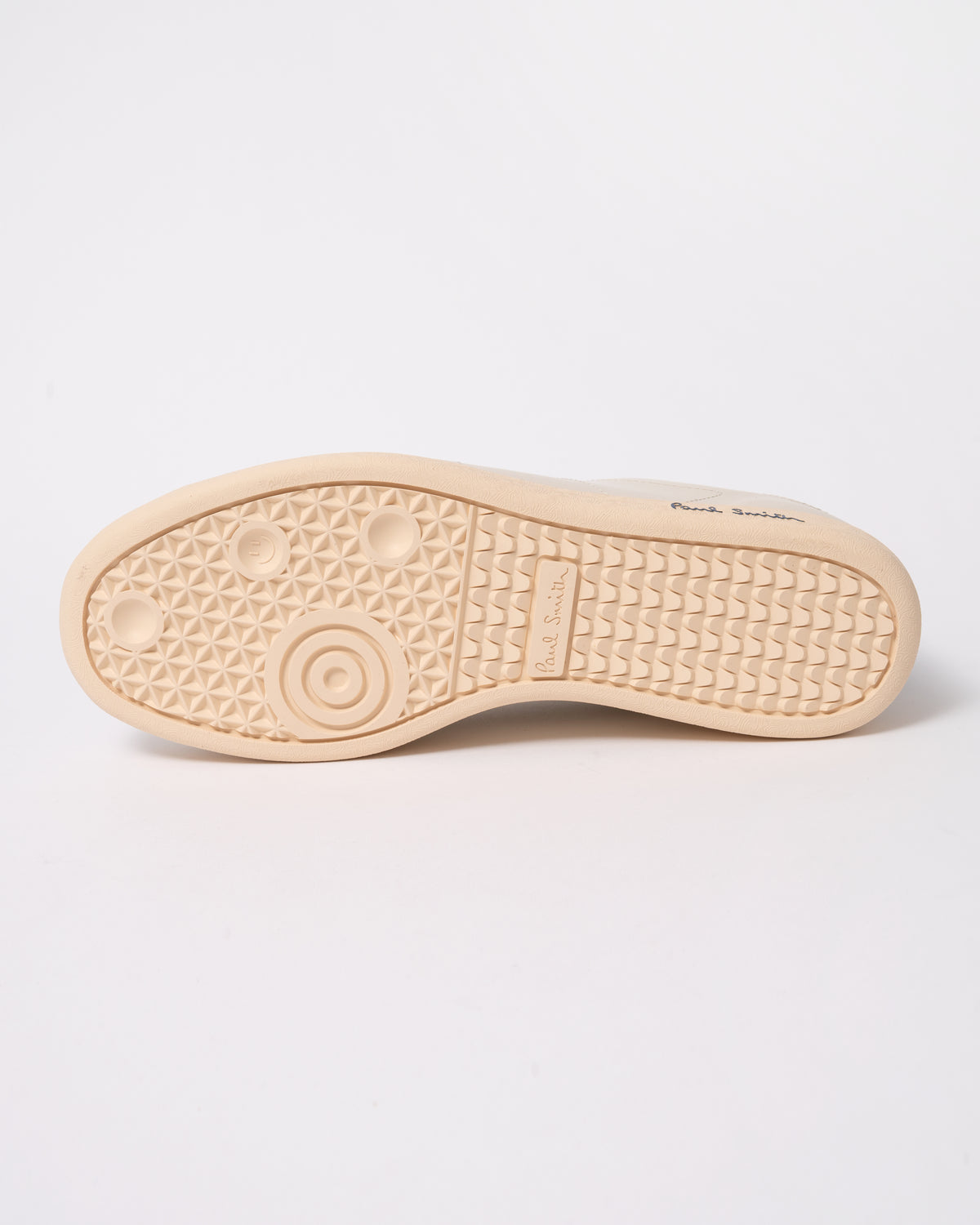 Studio photograph showing back of PS Paul Smith Chip Leather Mens Trainers in 01 White