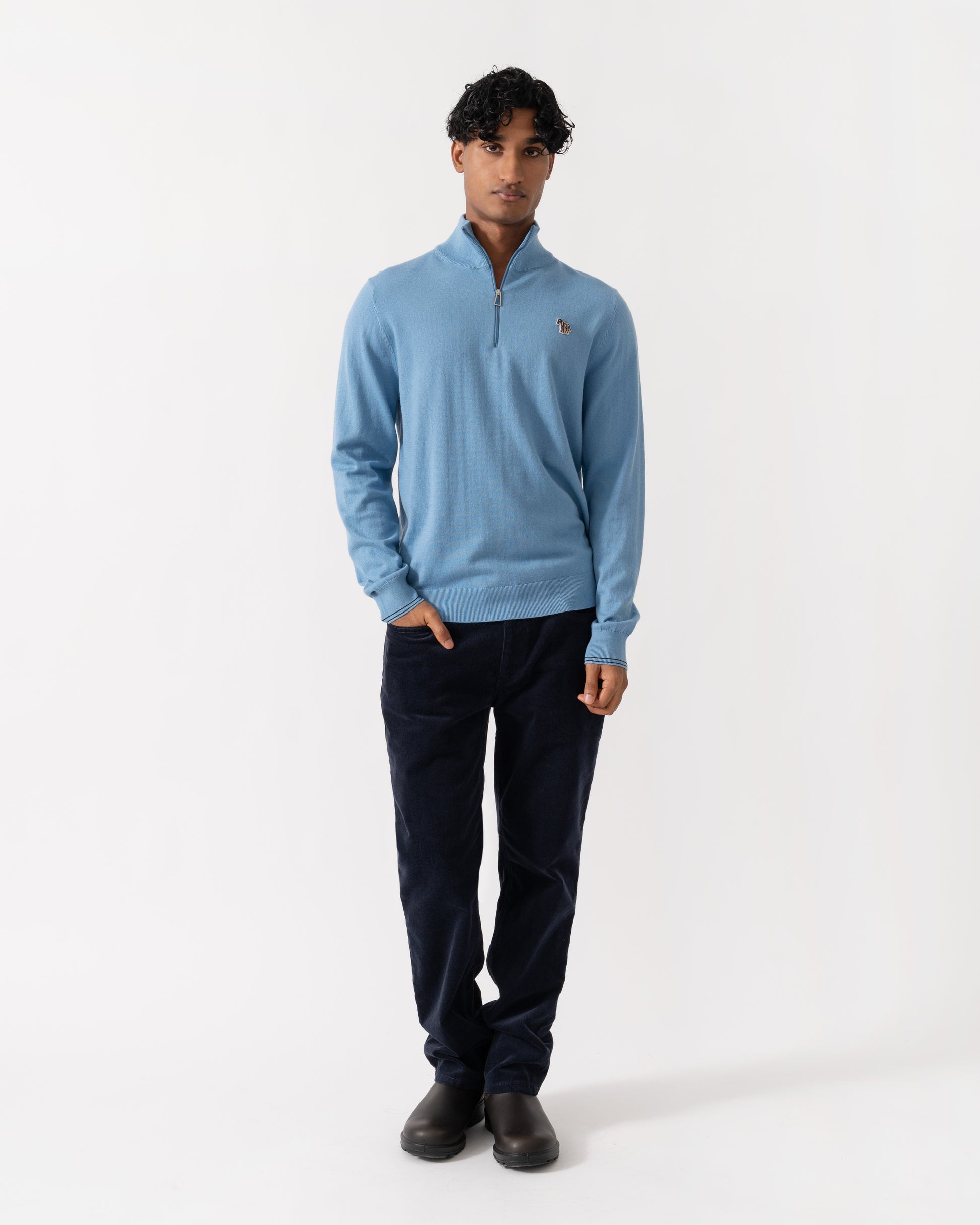 Man wearing PS Paul Smith Mens 1/4 Zip Zebra Badge Sweater - 40 Light Blue