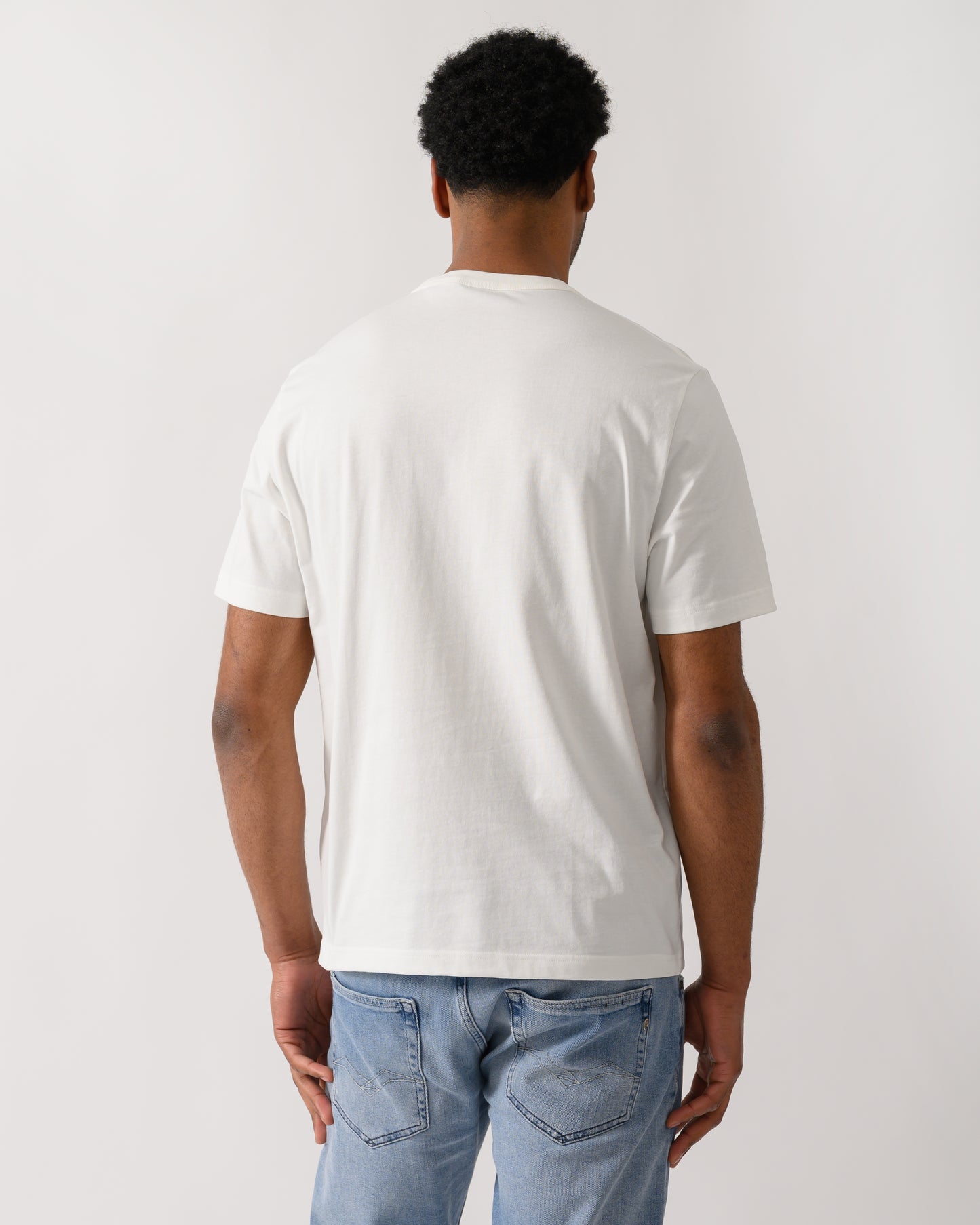 back shot of a model wearing PS Paul Smith Mens Casual Fit Stripe T-Shirt in 02 White