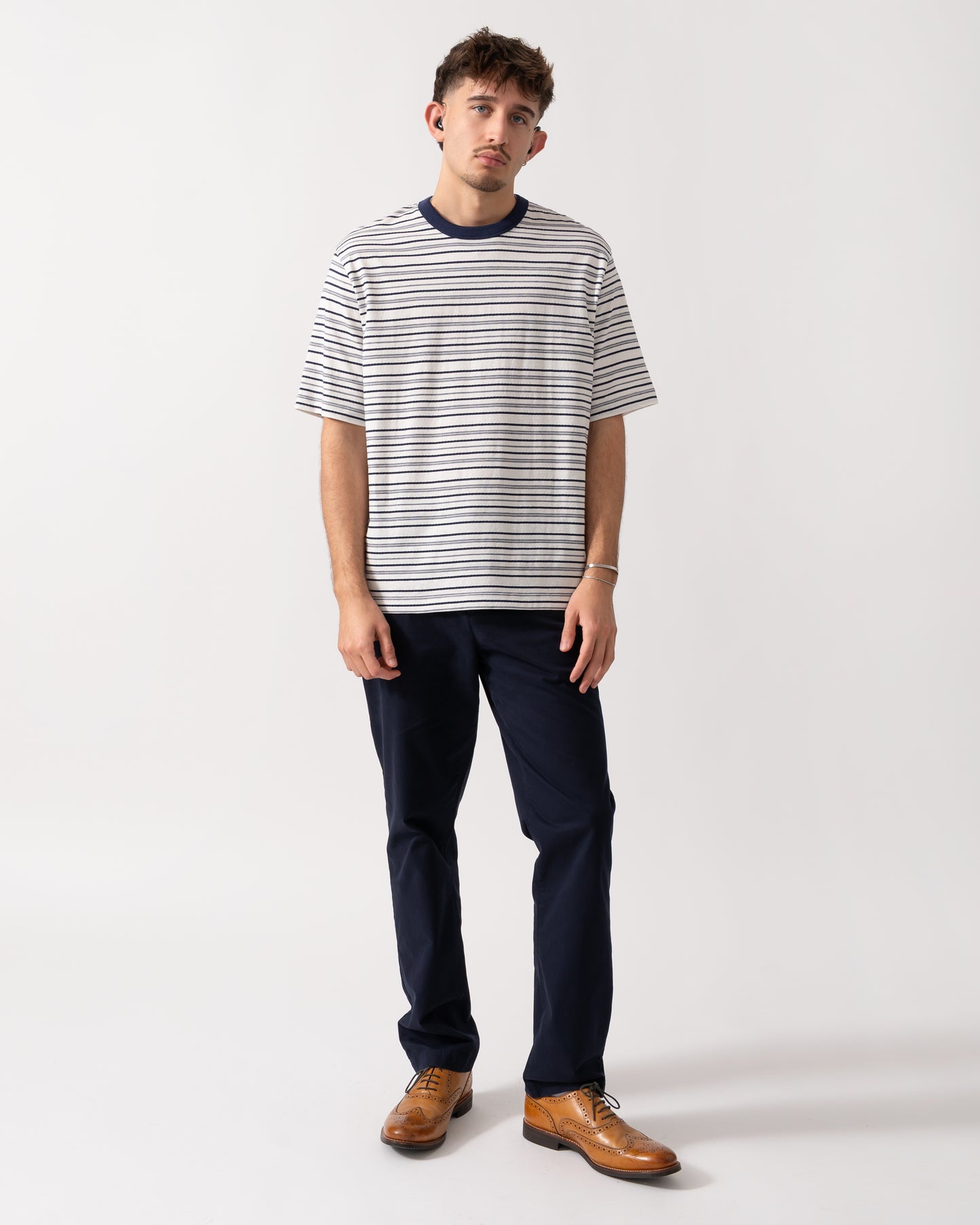 Full length shot of a Model wearing a PS Paul Smith Mens Casual Fit T-Shirt in Off White