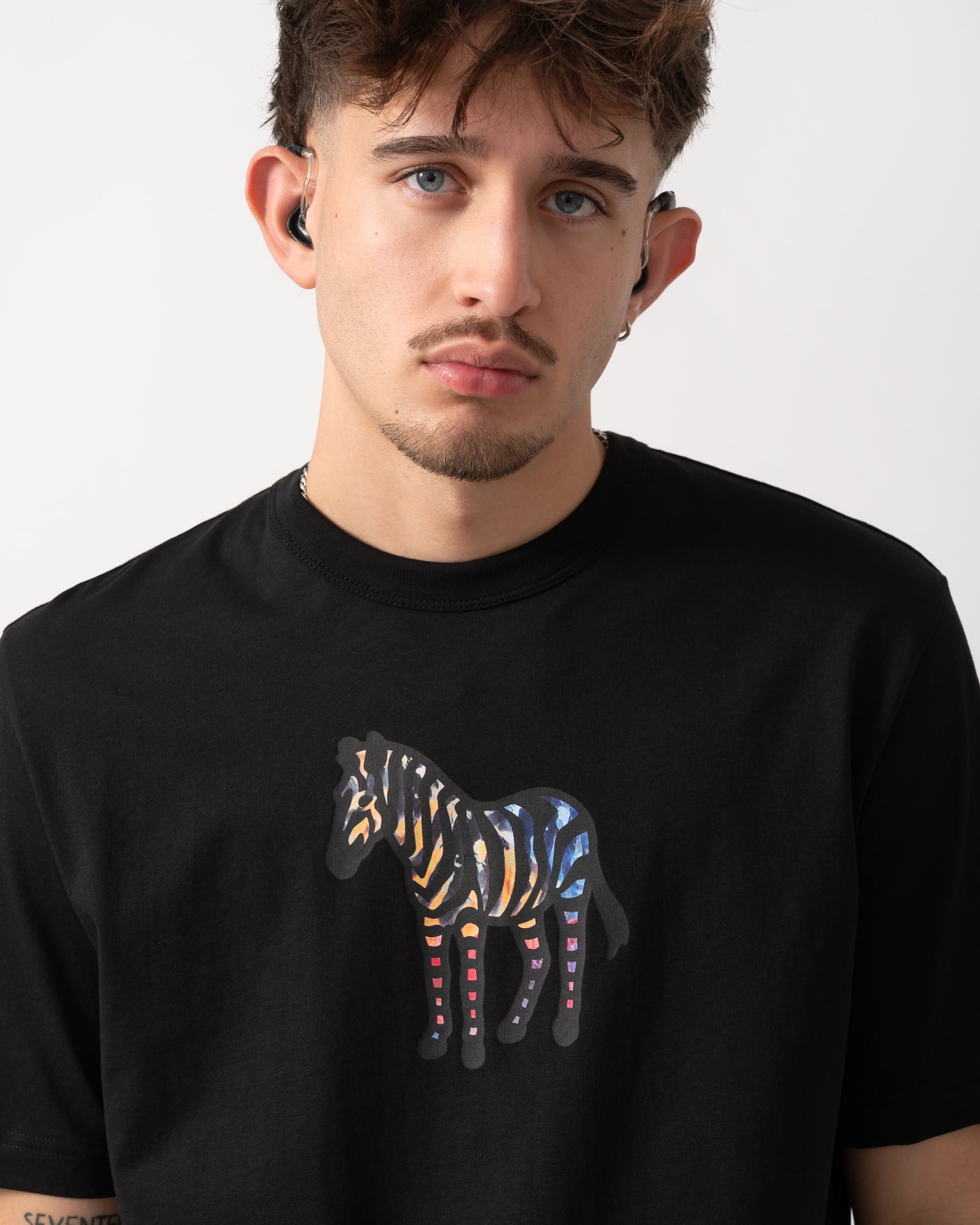 close up shot of a Model wearing a PS Paul Smith Mens Casual Fit Zebra T-Shirt in Black