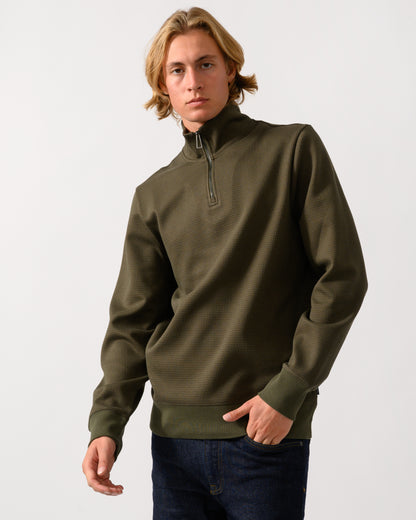 model wearing a PS Paul Smith Mens Classic Half Zip Top in 35 Military Green