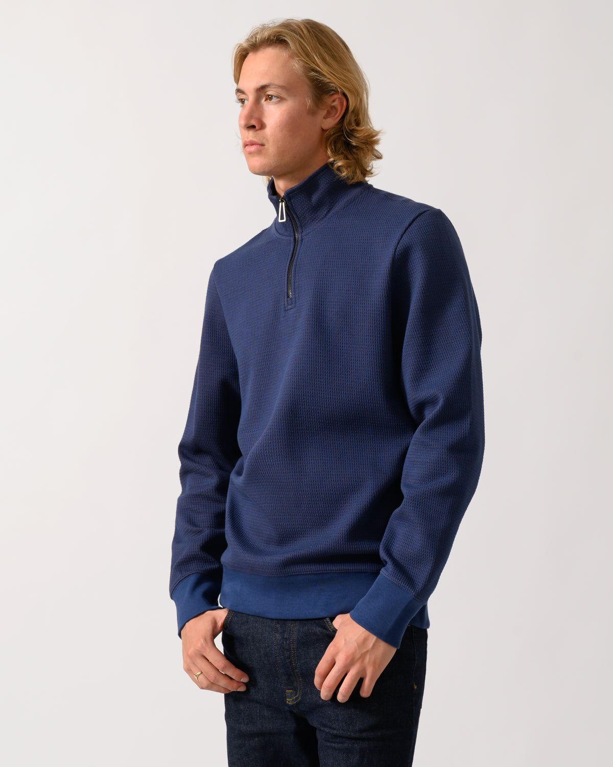 studio portrait of a model wearing a PS Paul Smith Mens Classic Half Zip Top in 46 Indigo