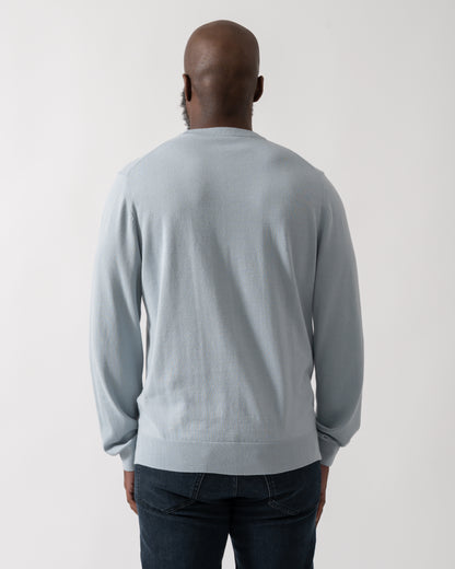 Back shot of a Model wearing a PS Paul Smith Mens Crew Neck Zebra Badge Jumper in Blue