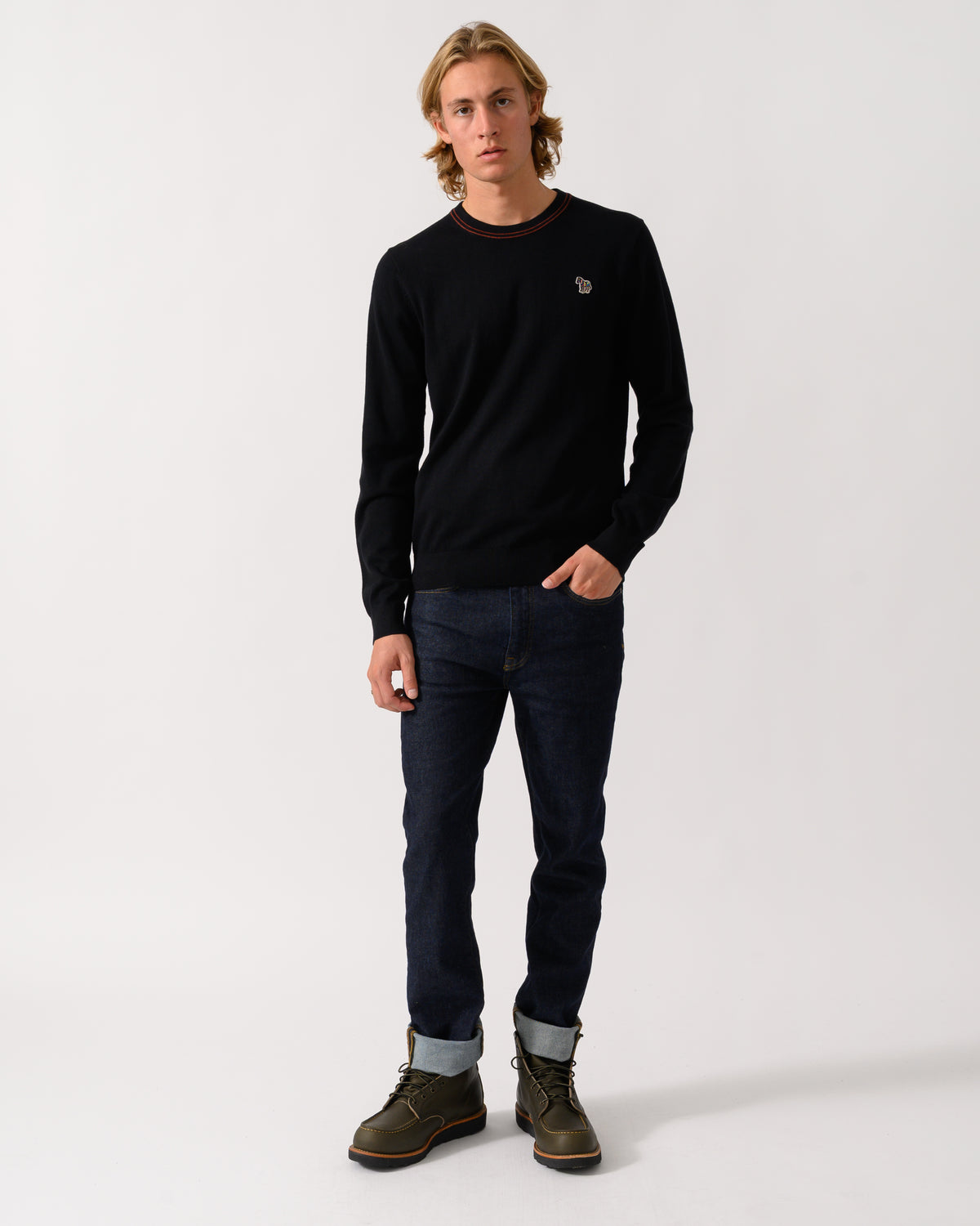 full length studio photograph of a PS Paul Smith Mens Crew Neck Zebra Badge Sweater in 79 Black