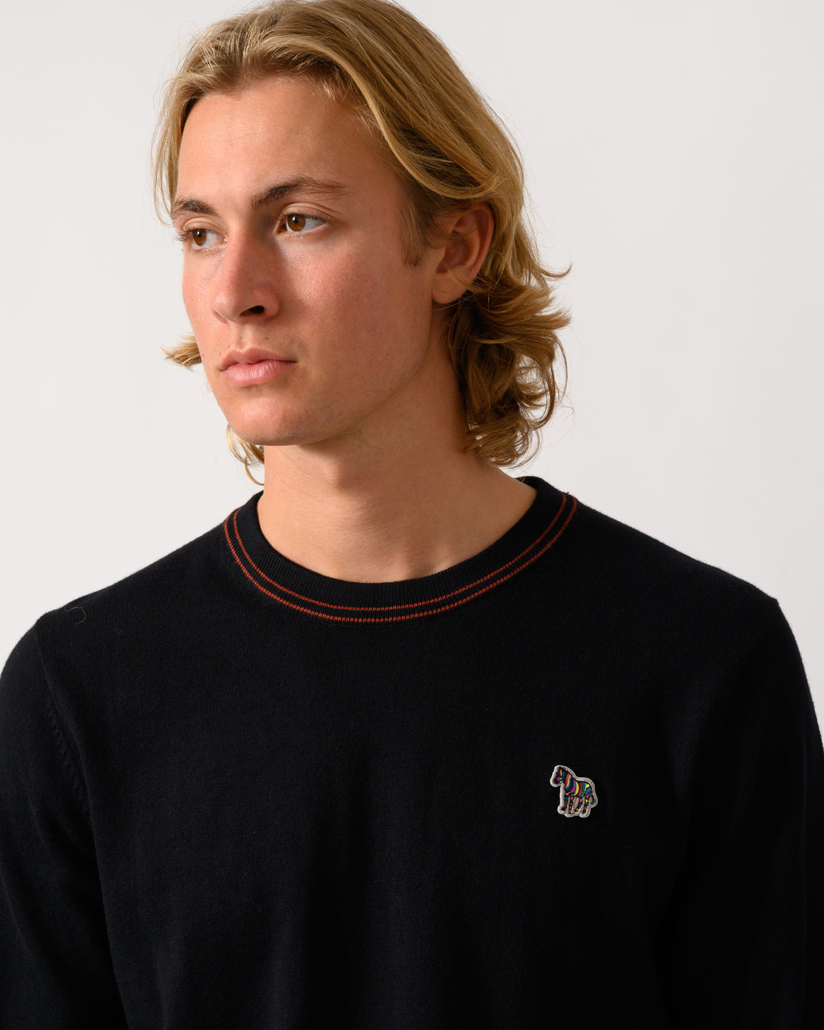 close up studio photograph of a PS Paul Smith Mens Crew Neck Zebra Badge Sweater in 79 Black