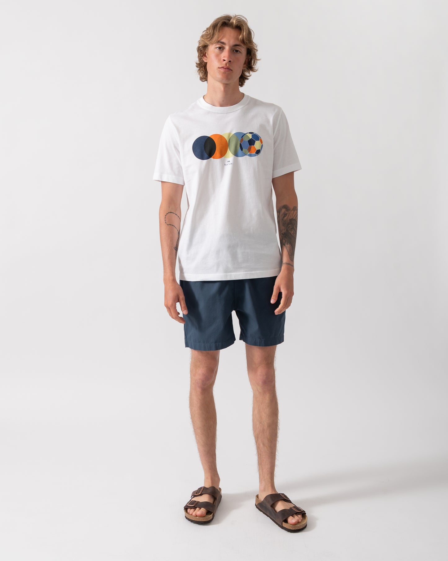 full length shot of a model wearing a PS Paul Smith Mens Football Graphic T-Shirt in 01 White