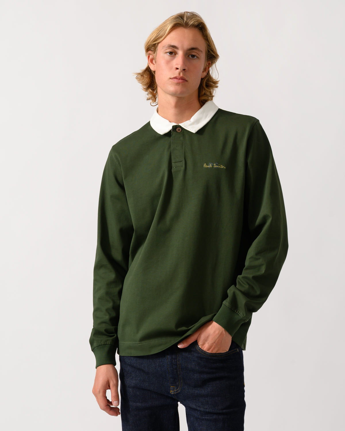 studio photograph of a model wearing a PS Paul Smith Mens Long Sleeve Signature Logo Polo in 38A Bottle Green