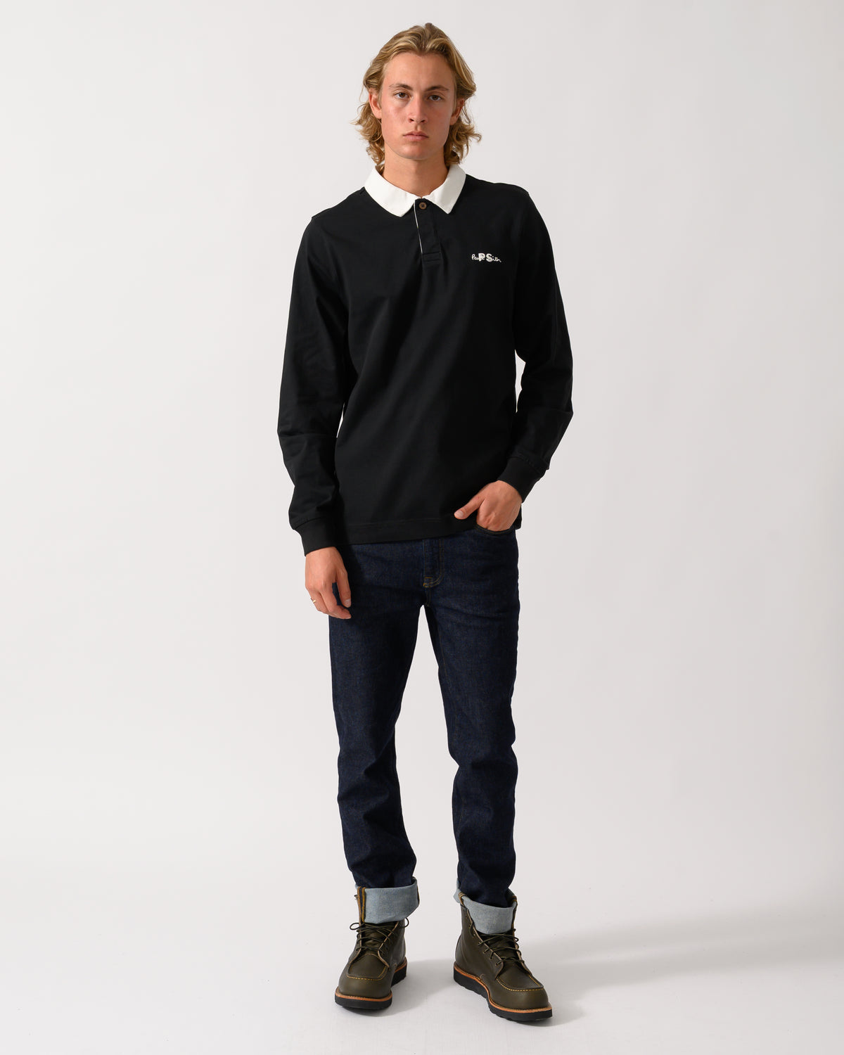 full length studio photograph of a model wearing a PS Paul Smith Mens Long Sleeve Signature Logo Polo a 79 Black