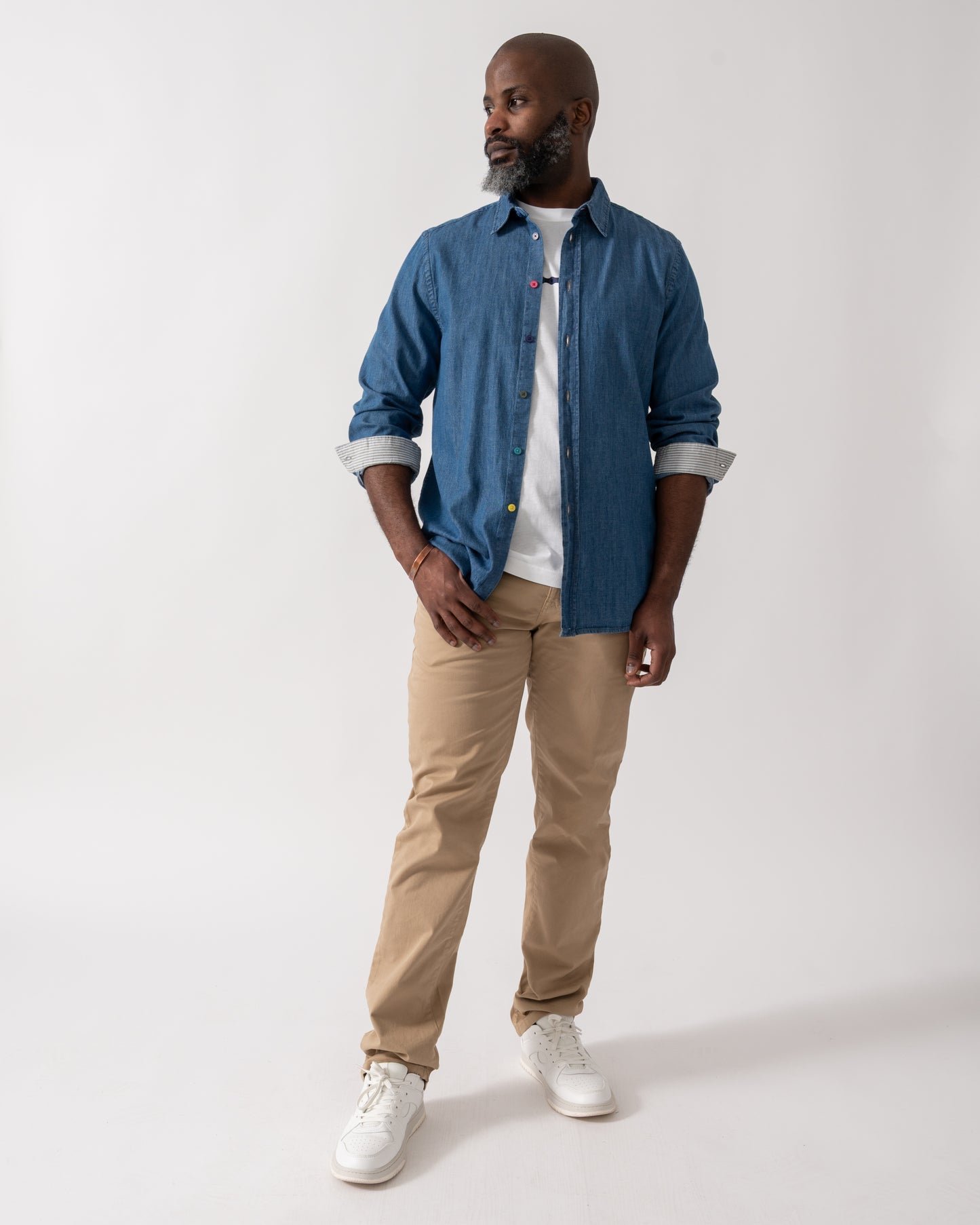 Full length shot of a Model wearing a PS Paul Smith Mens Long Sleeve Tailored Fit Denim Shirt SS Buttons in MD Blue