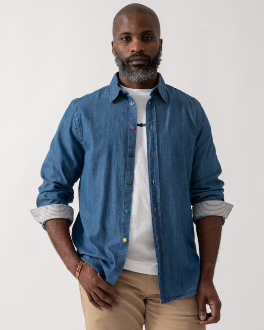 Model wearing a PS Paul Smith Mens Long Sleeve Tailored Fit Denim Shirt SS Buttons in MD Blue