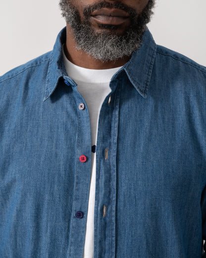 detail shot of a Model wearing a PS Paul Smith Mens Long Sleeve Tailored Fit Denim Shirt SS Buttons in MD Blue