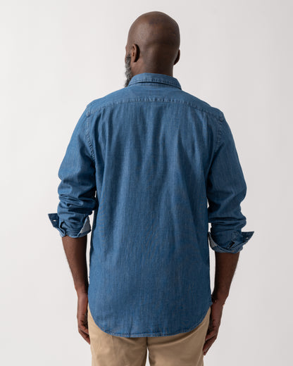 back shot of a Model wearing a PS Paul Smith Mens Long Sleeve Tailored Fit Denim Shirt SS Buttons in MD Blue