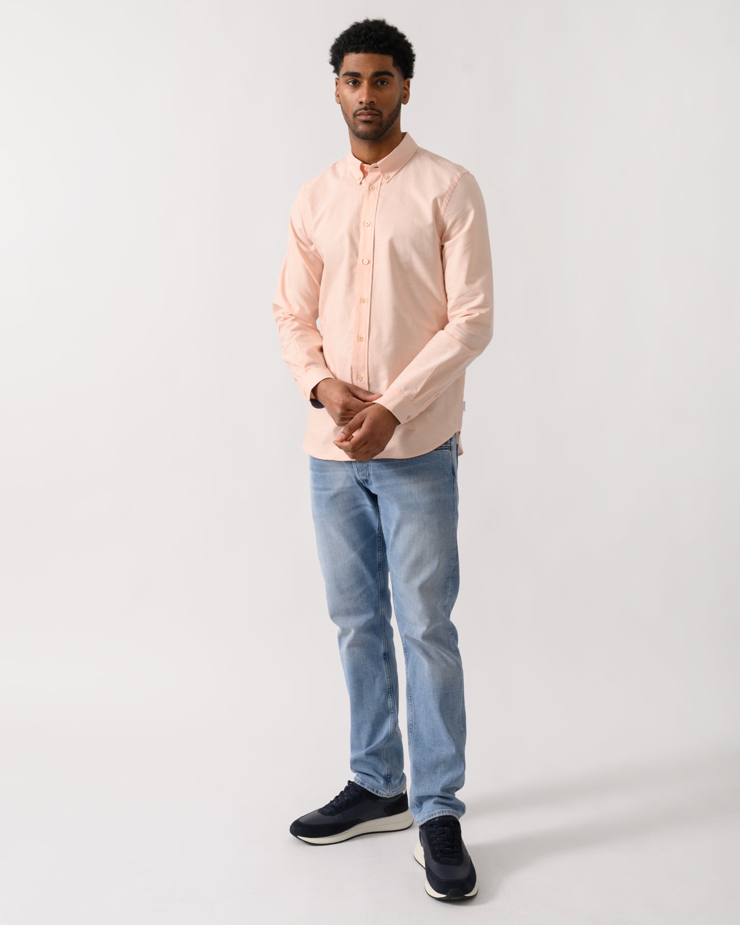 full length shot of a model wearing a PS Paul Smith Mens Long Sleeve Tailored Fit Shirt With Button Down Collar in Orange