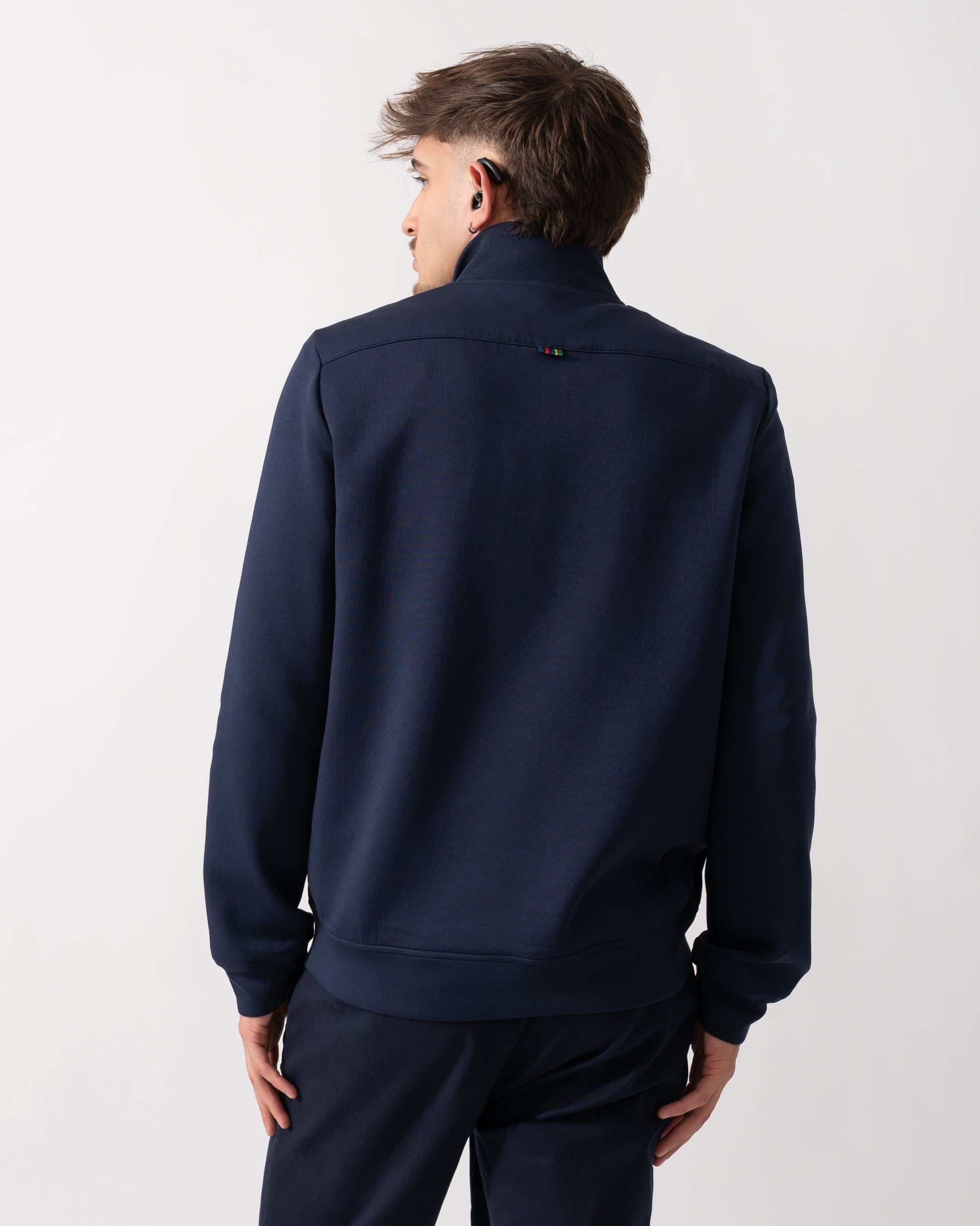 back of a Model wearing a Paul Smith Mens Mixed Media Jacket in Blue