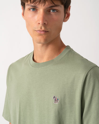 detail of a model wearing a PS Paul Smith Mens Organic Cotton Zebra Logo T-Shirt in 34D Light Greyish Green