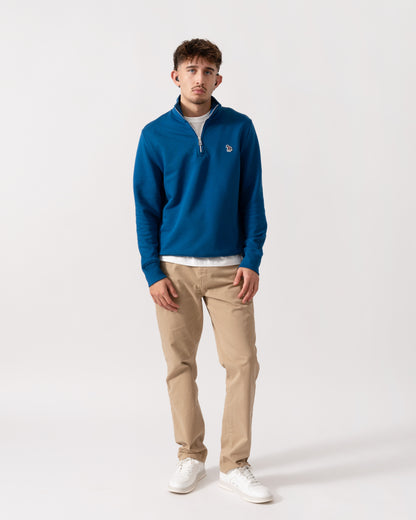 Full length shot of a Model wearing a PS Paul Smith Mens Reg Fit Half Zip Zebra Logo Top in Blue