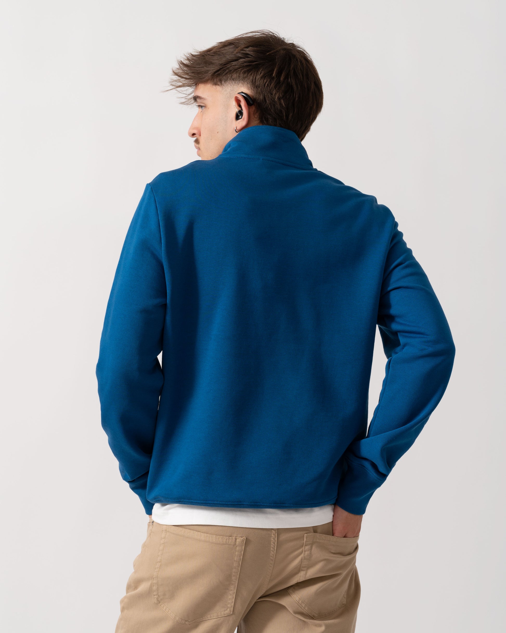 back shot of a Model wearing a PS Paul Smith Mens Reg Fit Half Zip Zebra Logo Top in Blue