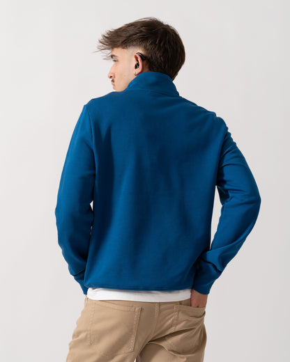 back shot of a Model wearing a PS Paul Smith Mens Reg Fit Half Zip Zebra Logo Top in Blue