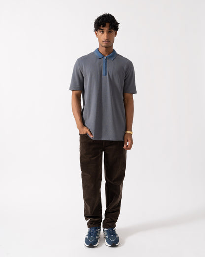 Man wearing the PS Paul Smith Mens Reg Fit Zip Polo Shirt - 46 Indigo