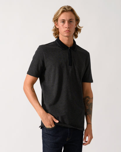 studio photograph of a model wearing a PS Paul Smith Mens Reg Fit Zip Polo Shirt in 79 Black