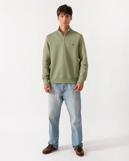 full length of a model wearing a PS Paul Smith Mens Regular Fit Half Zip Sweatshirt with Zebra Logo in 34C Light Greyish Green