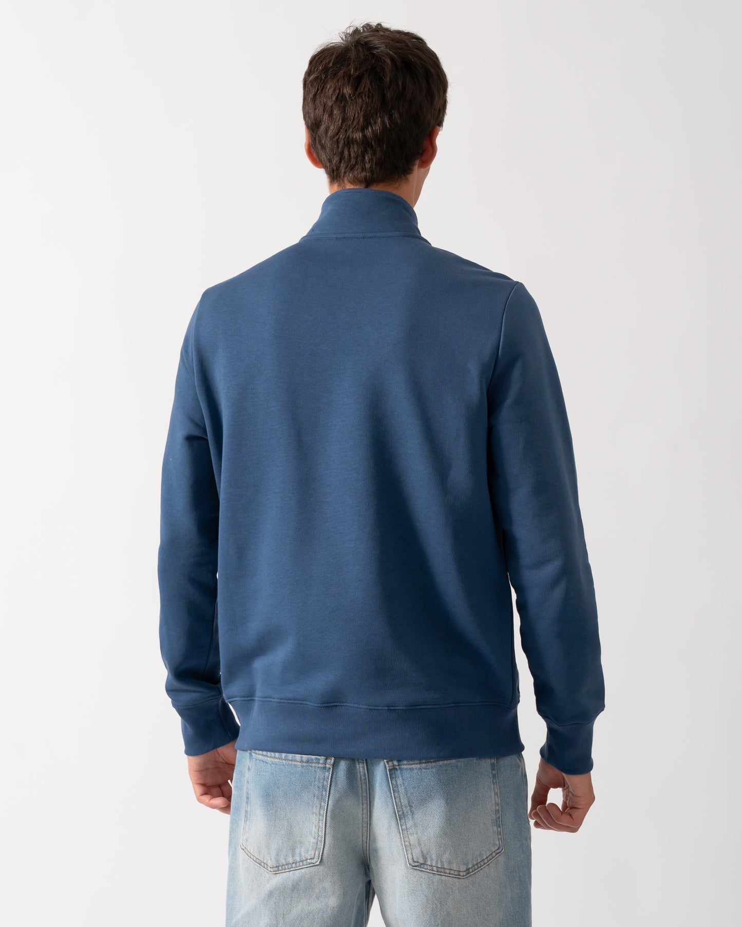 back of a model wearing a PS Paul Smith Mens Regular Fit Half Zip Sweatshirt with Zebra Logo in 46D Indigo