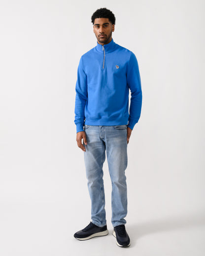 full length shot of a model wearing a PS Paul Smith Mens Regular Fit Half Zip Zebra Logo Top in 45E Blue