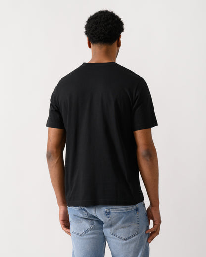 back shot of a model wearing a PS Paul Smith Mens Regular Fit Lollies T-Shirt in 79 Black