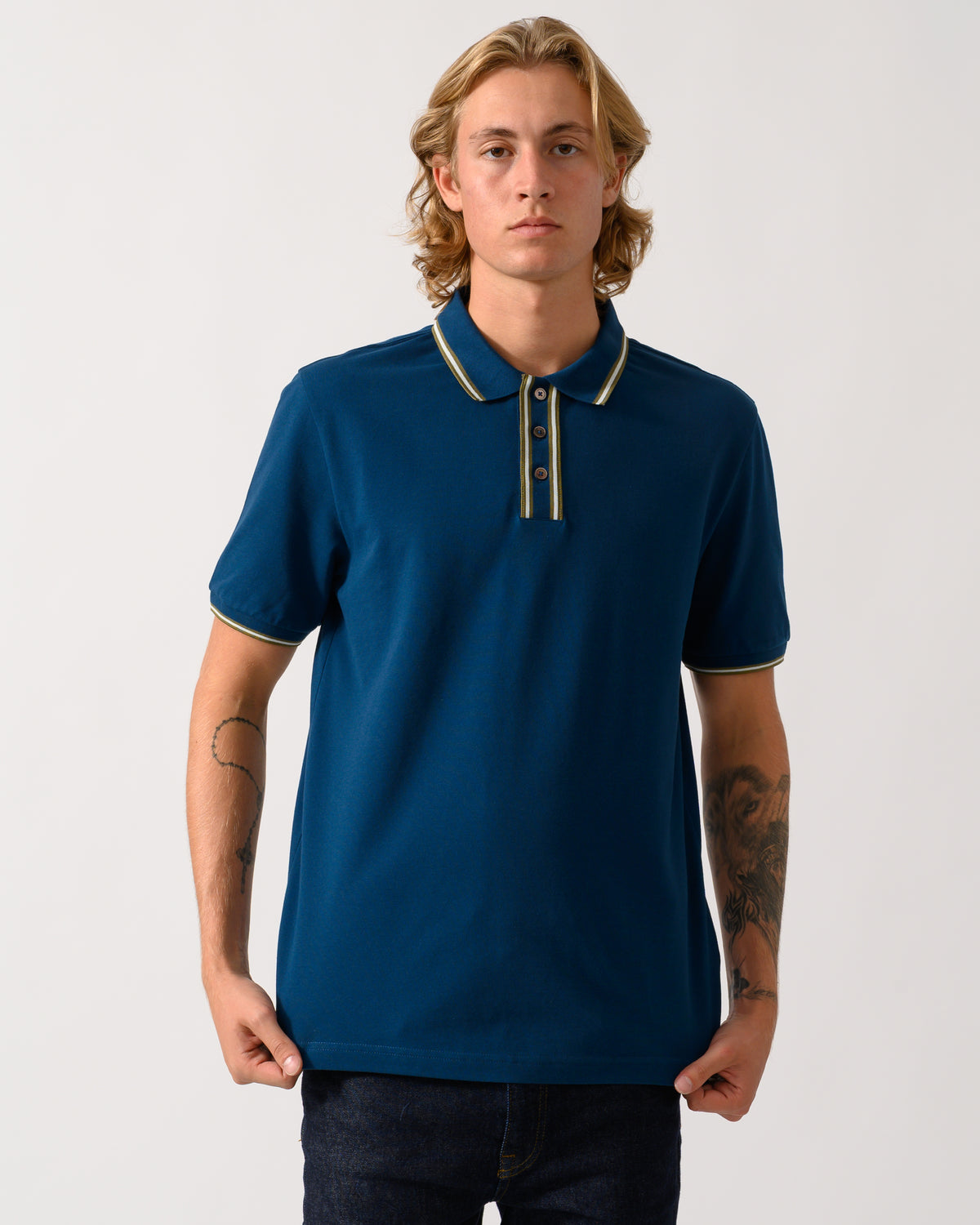 studio photo of a model wearing a PS Paul Smith Mens Regular Fit Polo Shirt with Tipping in 47 Navy