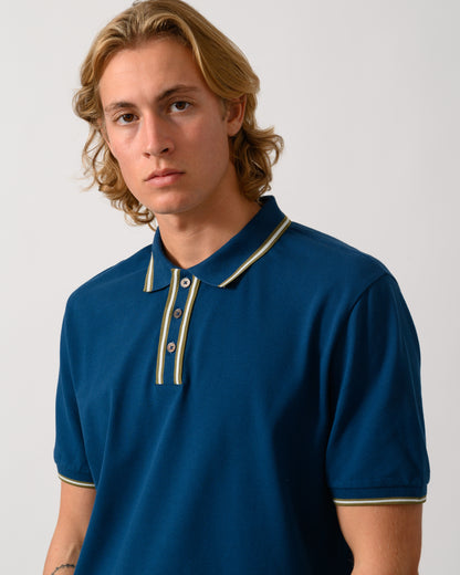 close up studio photo of a model wearing a PS Paul Smith Mens Regular Fit Polo Shirt with Tipping in 47 Navy