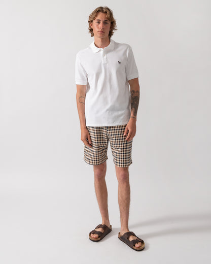 full length shot of model wearing a PS Paul Smith Mens Regular Fit Short Sleeve Zebra Logo Polo Shirt M2R-183K-WZEBRA in 01 White