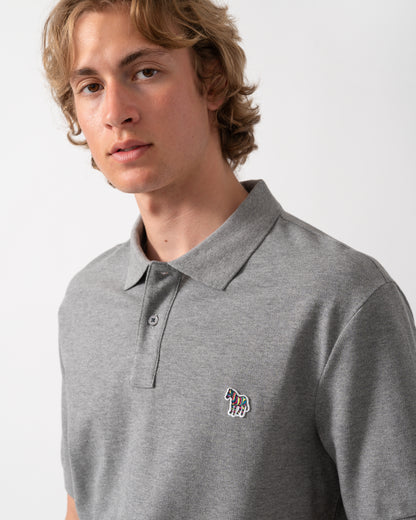 close up of model wearing a PS Paul Smith Mens Regular Fit Short Sleeve Zebra Logo Polo Shirt M2R-183K-WZEBRA in 72 Grey