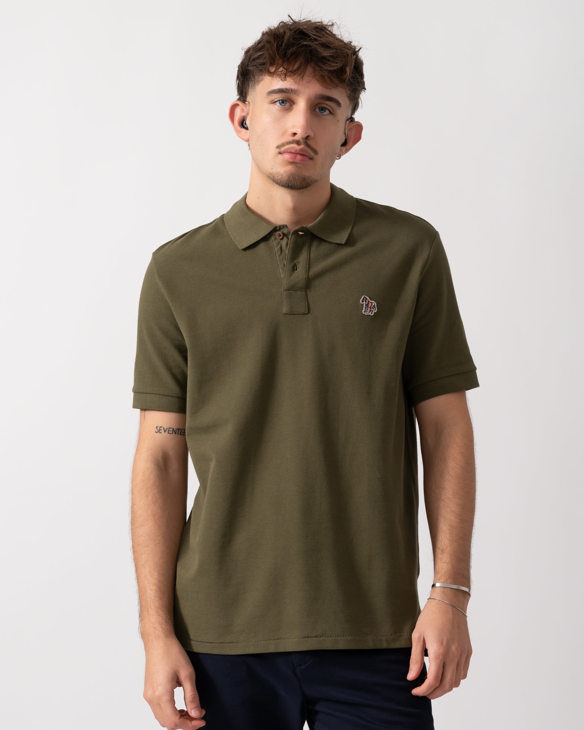 Model wearing a PS Paul Smith Mens Regular Fit Short Sleeve Zebra Polo Shirt in Green