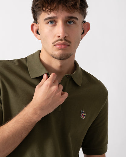 Close up of a Model wearing a PS Paul Smith Mens Regular Fit Short Sleeve Zebra Polo Shirt in Green