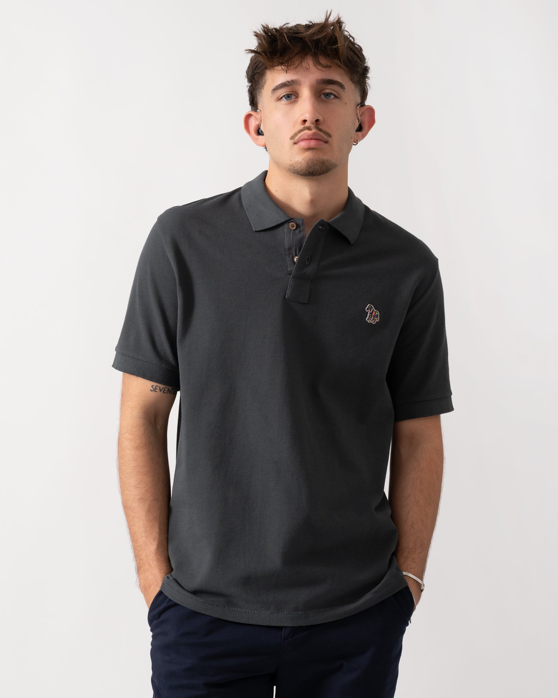 Model wearing a PS Paul Smith Mens Regular Fit Short Sleeve Zebra Polo Shirt in Grey